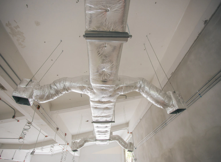 ductwork of a building with a white ceiling